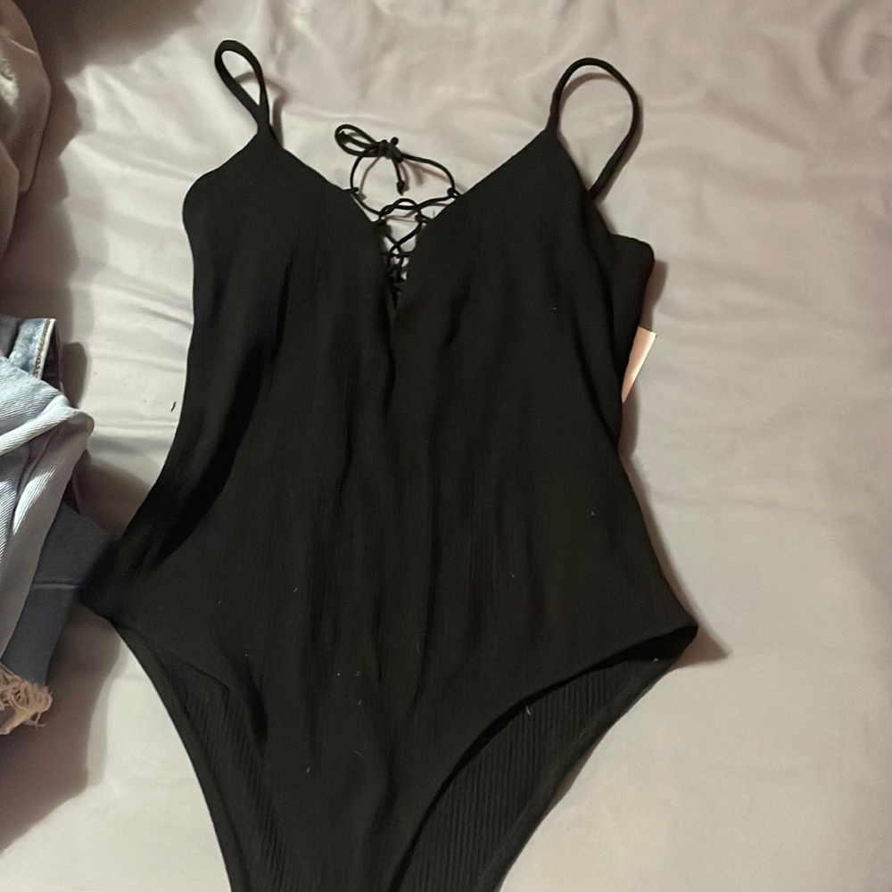 Black bershka bodysuit. Never been worn, tags still on. Size small